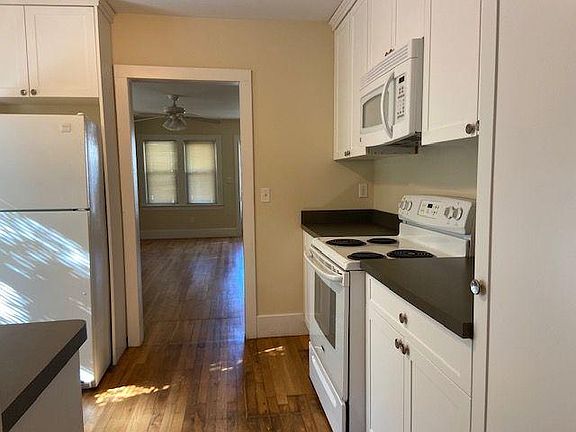 Kitchen area looking into living room