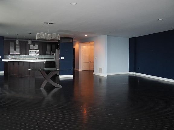 View of kitchen, dining room, and living room area