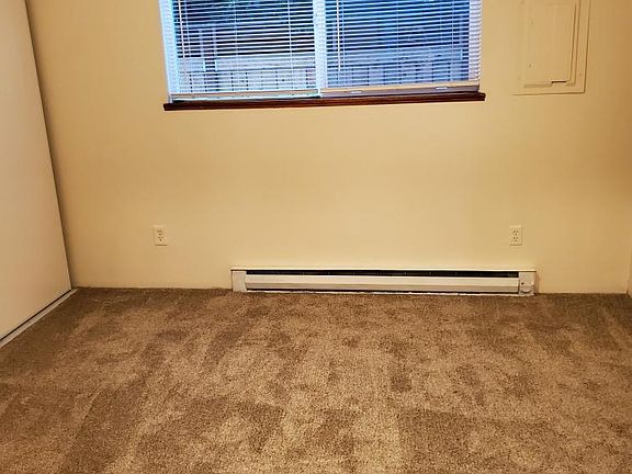 This is the Bedroom, it is in the back of the apartment as you can kind of see with the pictures and layout. You have a nice view of some nice big trees out back. No patio unfortunately, but a nice view.