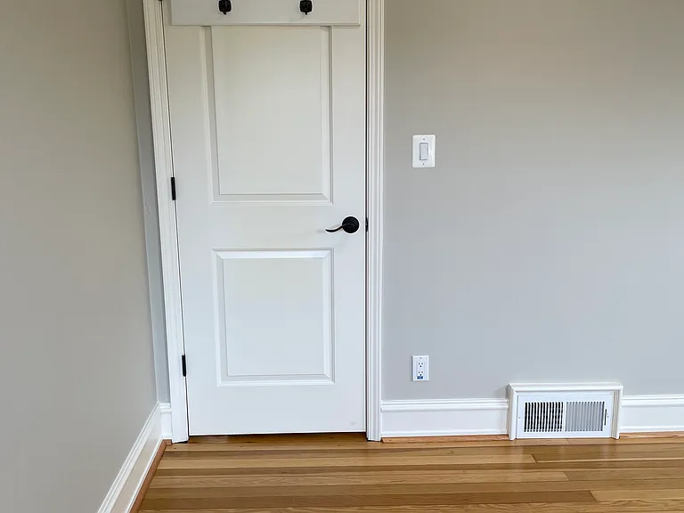 Primary Bedroom entrance with hooks on door