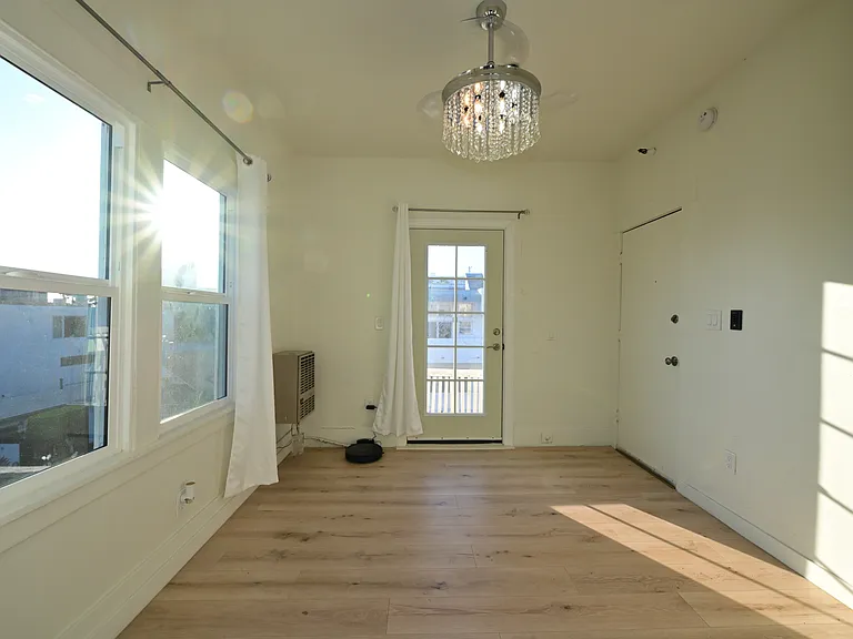 Cute top-floor fully upgraded studio unit w/ ocean views and in-unit laundry - direct door to private balcony