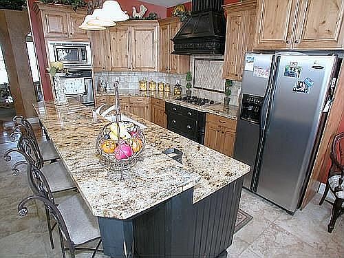 Gorgeous custom kitchen w/furniture-style cabinetry and granite counters