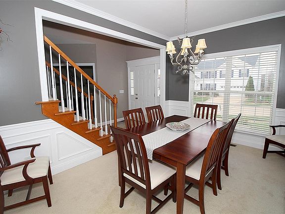Formal Dining Room with beautiful wood trim.