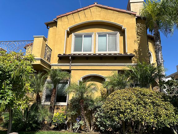 Tree-lined front yard