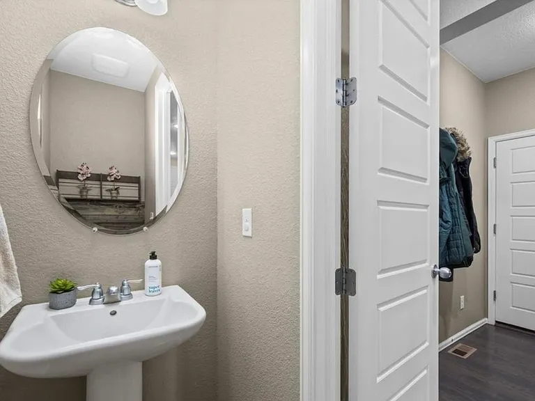 Half bath on first floor near garage entrance