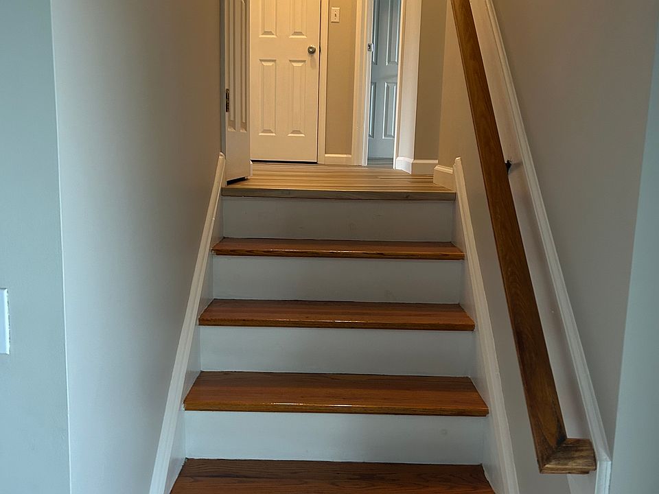 Interior stairs up to bedrooms and baths