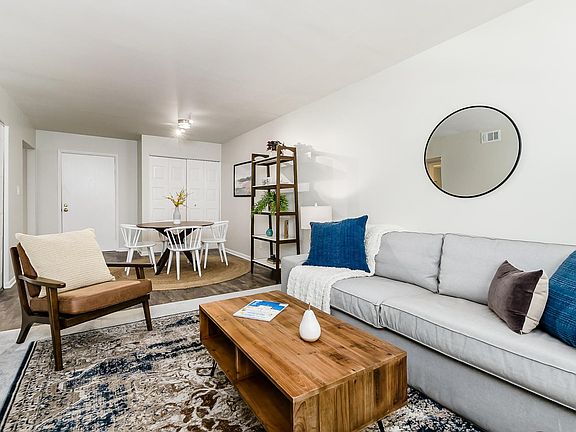 living room and dining area with large coat closet
