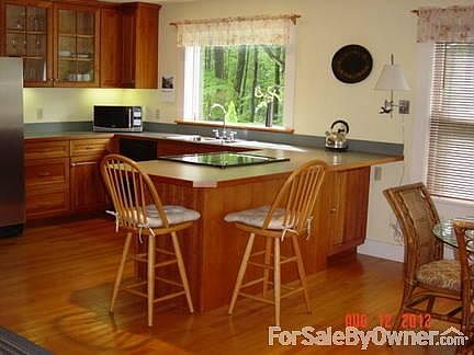 149 George St
						:
						At left, entry to upper apt. Entrance to main house through covered porch.