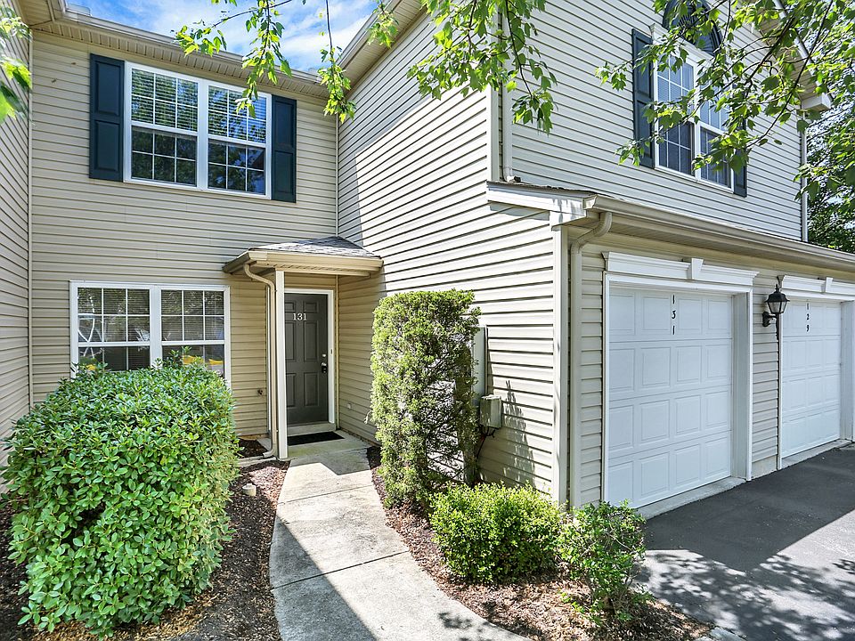 Front of house. One car garage