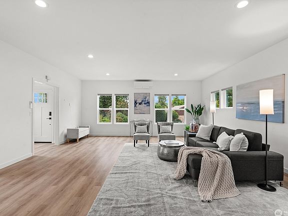 Large living room with lots of windows