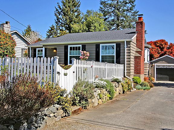 Long, wide, flat driveway is great for off street parking, RV parking, boat parking. Drip irrigation on side of home. Driveway also fenced on side you cannot see.