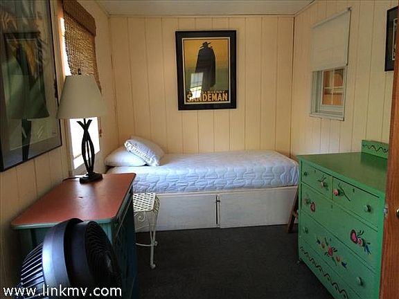 sunporch/office room has French doors to kitchen area and separate door to deck