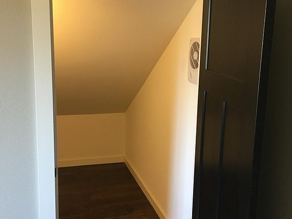 Upstairs 2nd bedroom closet. Closet goes the length of the room to the left, inside.