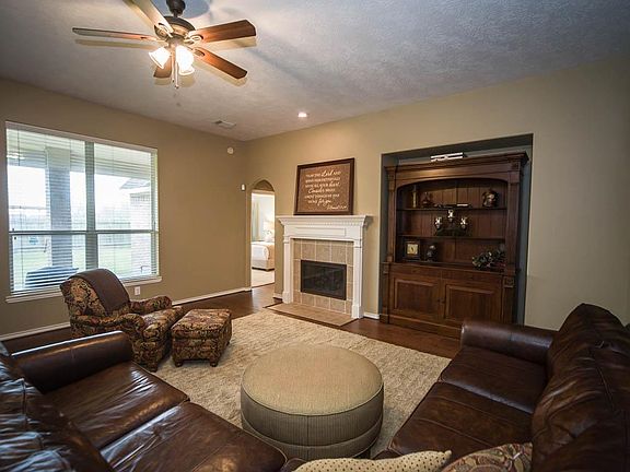 ....gas fireplace make this family room warm and inviting.