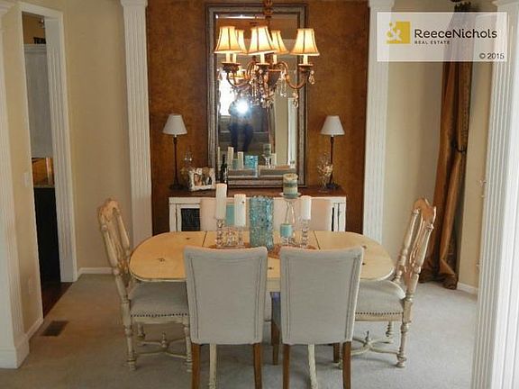 Formal dining room is ready for entertaining.