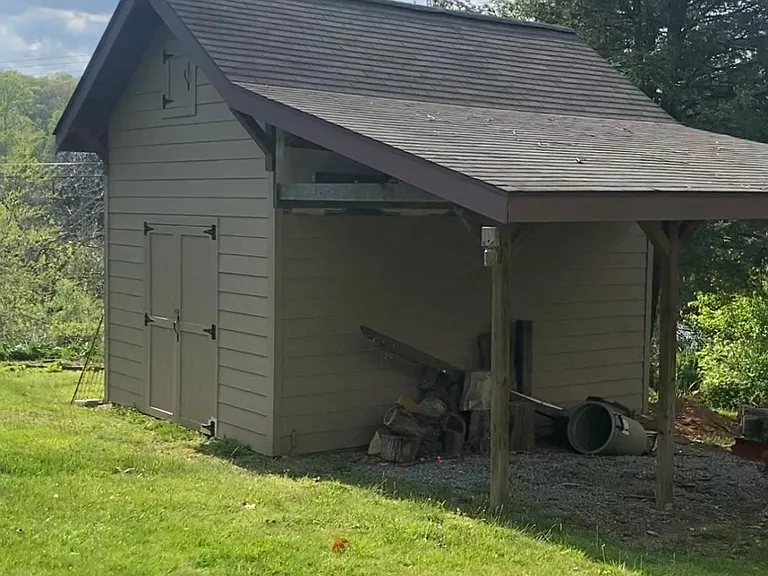 Shed with electric, concrete floors, etc.