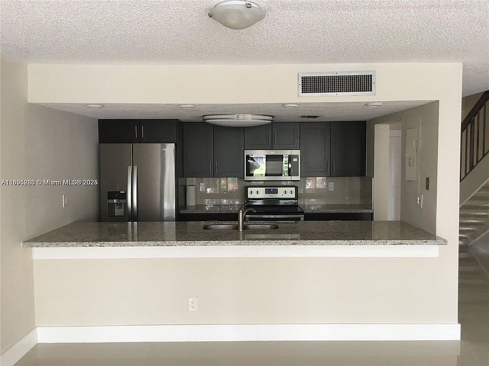 1st image of 10951 N Lakeview Dr #Townhouse