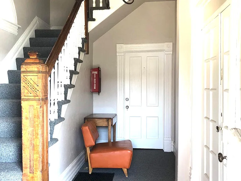 Entry Hall, 2 apartments downstairs, 2 upstairs. Beautiful original woodwork, casing. A lot of charm and character.