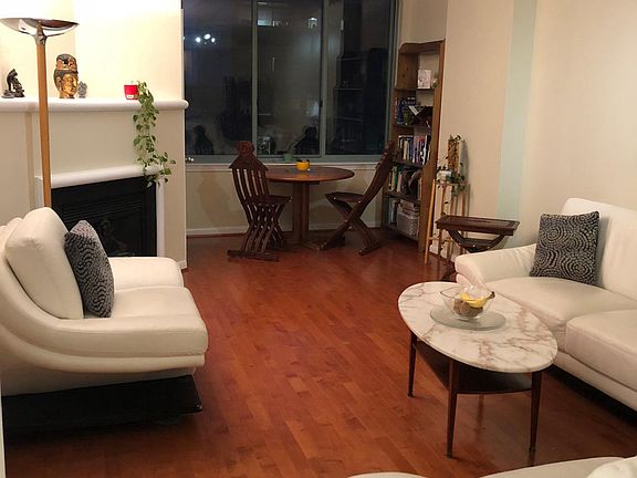 Living room, west view with beautiful sunset, hardwood floor