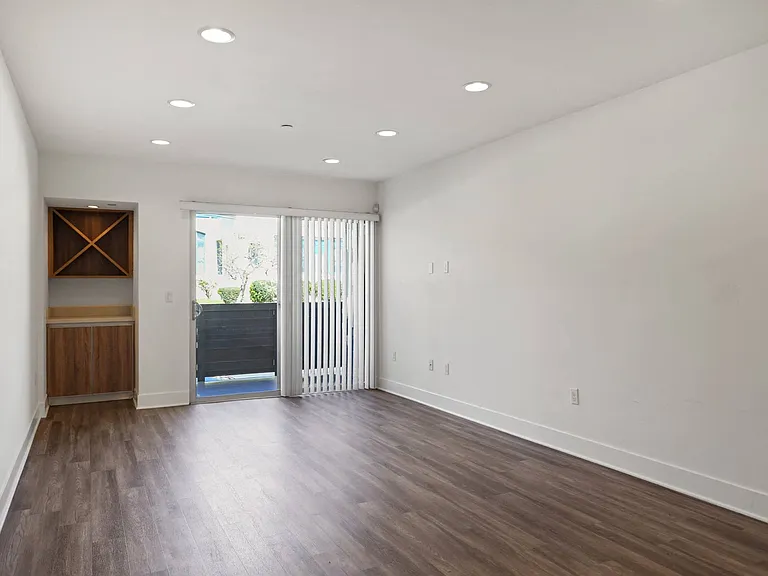 Living Room with Built-In Bar and Patio