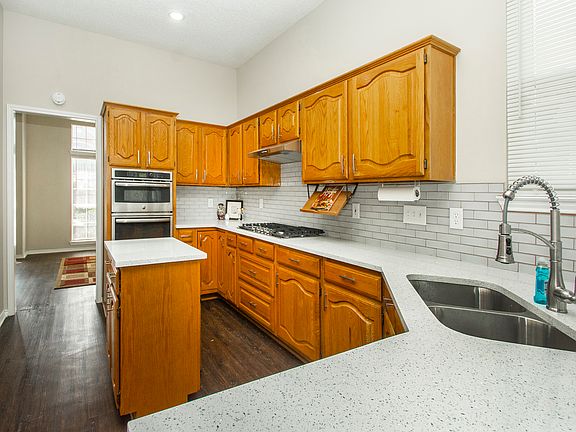 New countertops, new gas stovetop, new fixtures