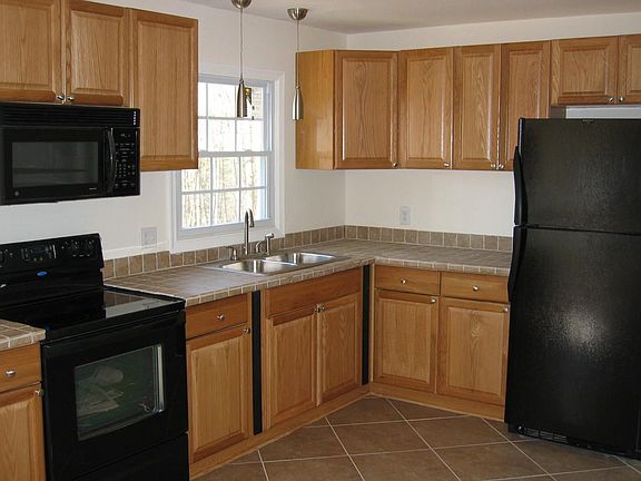 Check out the new kitchen with ceramic tile flooring