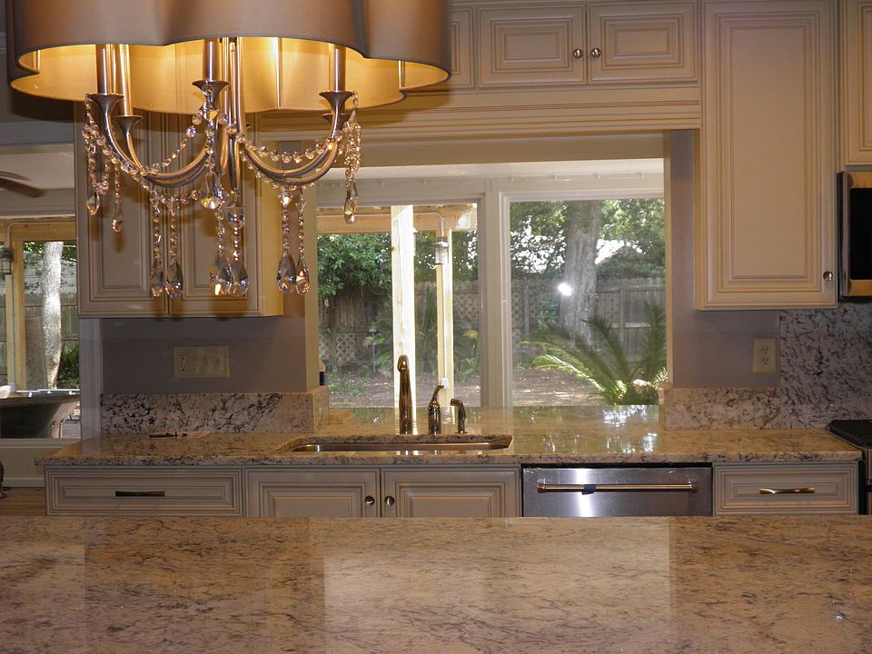Renovated Kitchen with huge slab of granite for the kitchen island