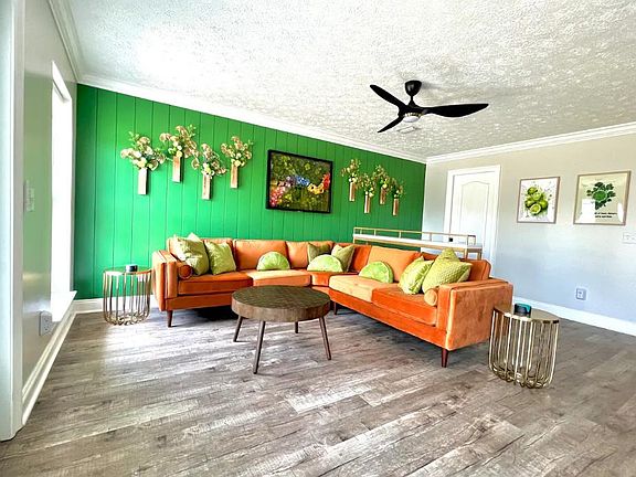 Spacious living room with luxe furniture's complete with bar stool area