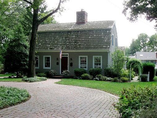 Front of house with circular driveway
