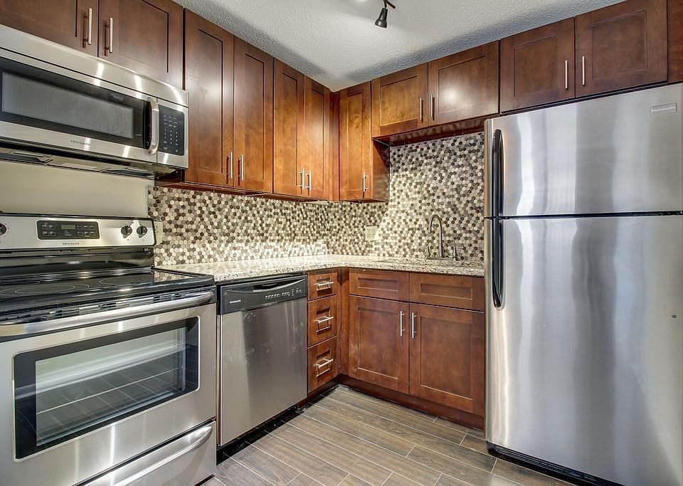 Newly renovated kitchen with granite and stainless steel app
