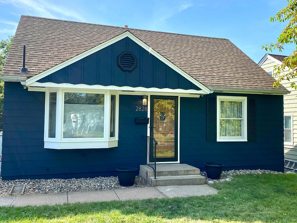 Great curb appeal! Full view storm door to showcase a beautiful solid wood front door with stained glass.