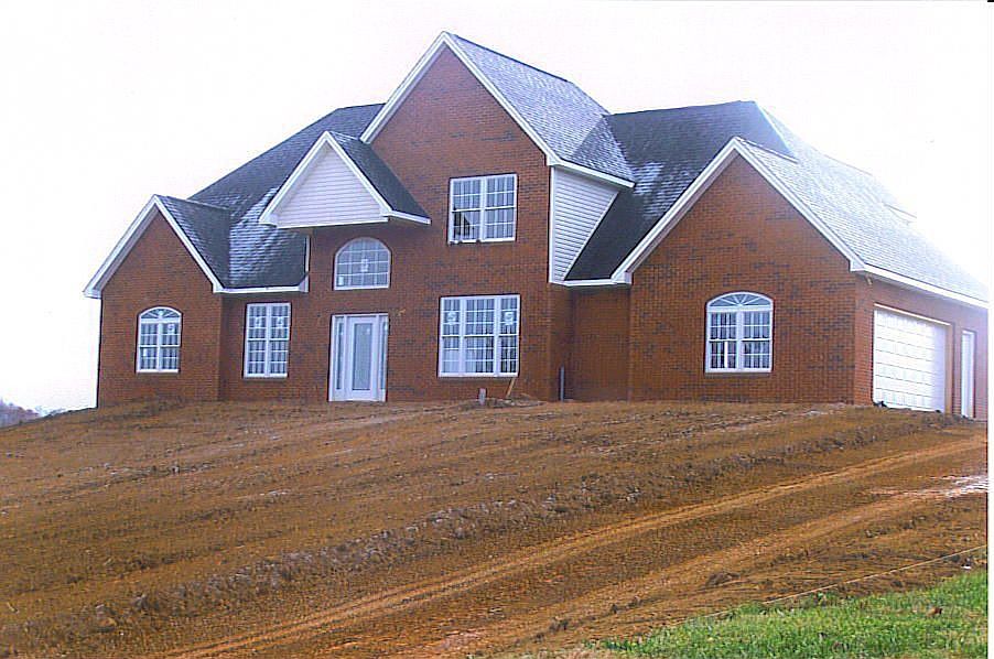 All brick 2-story home by Frank Southerland.