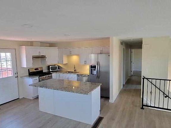 Kitchen and upper level