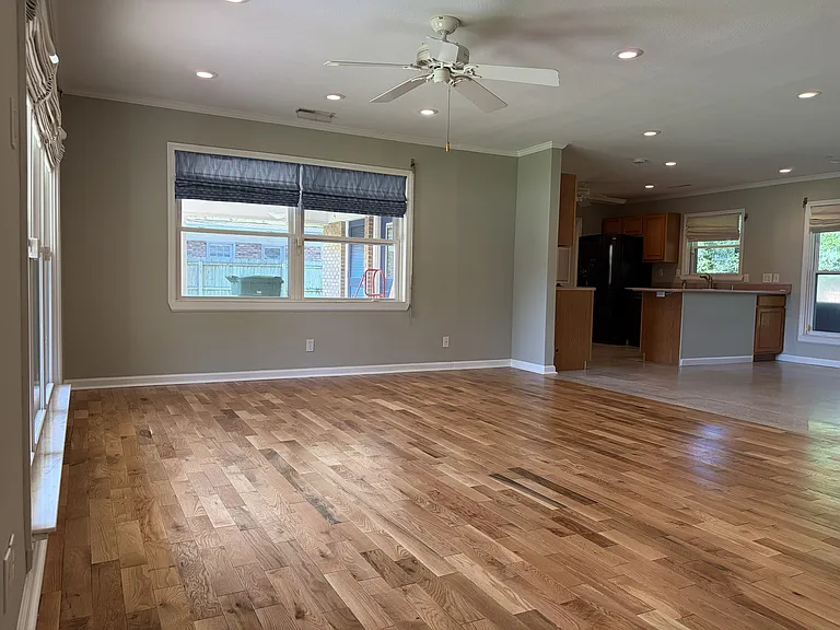 Welcome home! Step inside to an inviting open floor plan featuring beautiful hardwood floors, abundant natural light, and seamless flow into the dining area and kitchen.