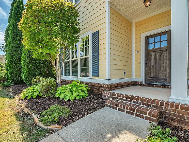 Nicely landscaped front flower beds