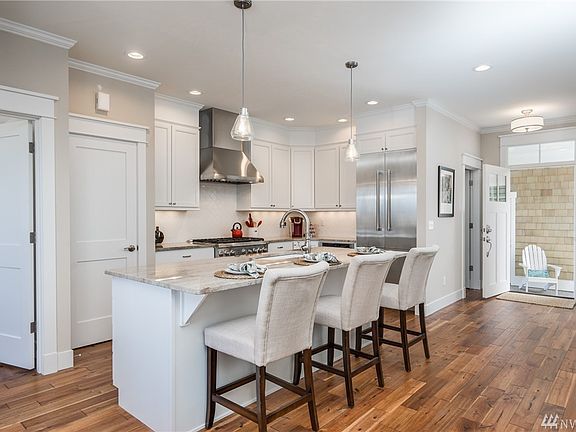 Kitchen has Thermador Pro series appliances.
