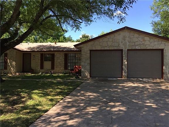 Garage doors have been replaced!  Garage features a work closet and a side entry door to back yard!