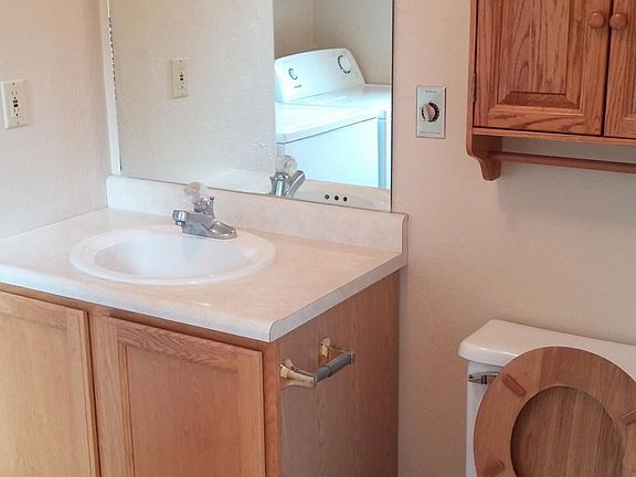 Half bathroom in laundry room off of first floor bonus room.