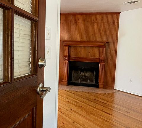 View of living room/fireplace from the front door