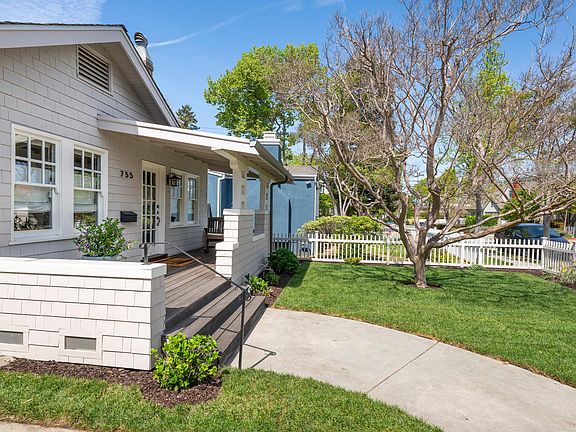 Beautiful Craftsman home with classic front porch and landscaped lawn in a prime Burlingame location.