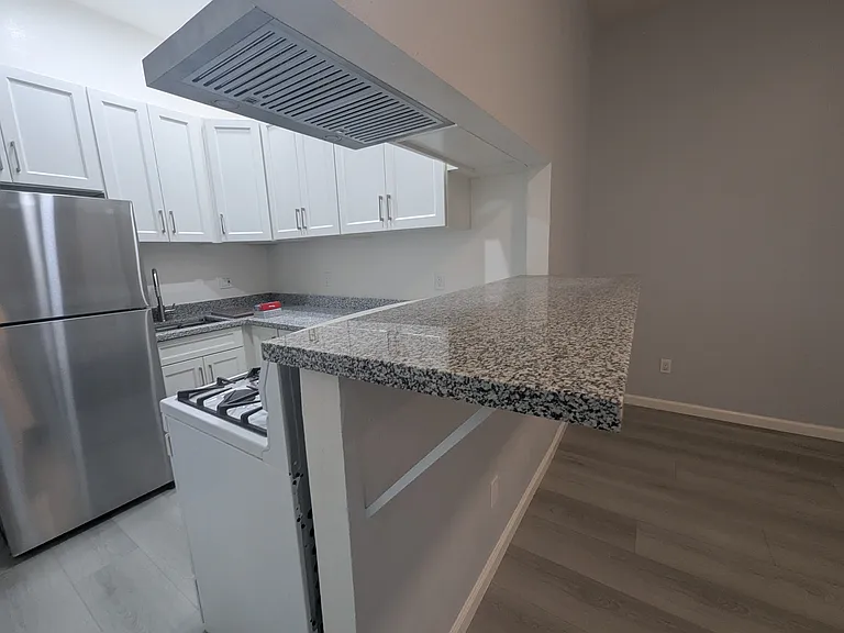 Kitchen and living room.