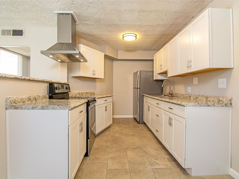 All New Kitchen Appliances, Cabinets, Tile Flooring, Countertops, Light fixtures