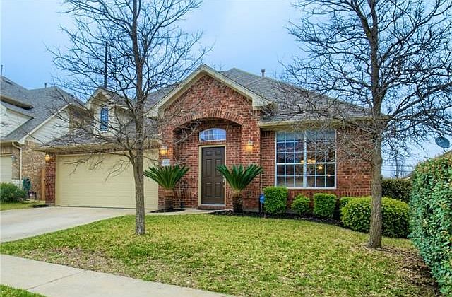 You will love this delightful two-story brick home in the esteemed neighborhood of Steiner Ranch!