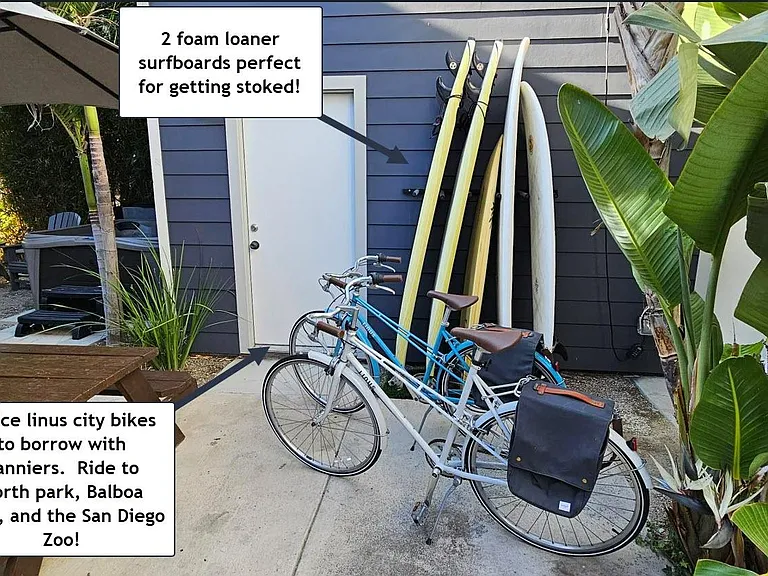 loaner surfboards and Linus city bikes for tenants to use