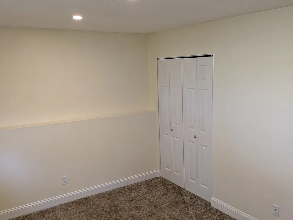 Bedroom #1, bedroom #2 is near identical in size. Layout is the same, both bedrooms have a closet.