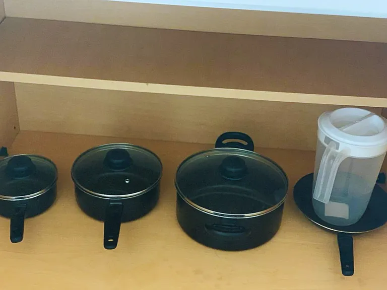 Fully Stocked with Pots, Pans & Cookware.
