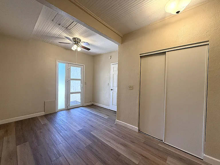Primary Bedroom has Direct Access to Back Patio