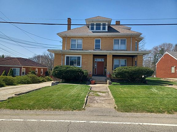 Street View of Building. apartment 1, located 1st flr, right side of building.