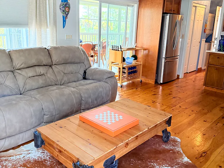 Step inside a warm and inviting living room with beautiful floors