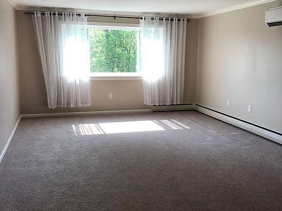LARGE living room with sheer curtain